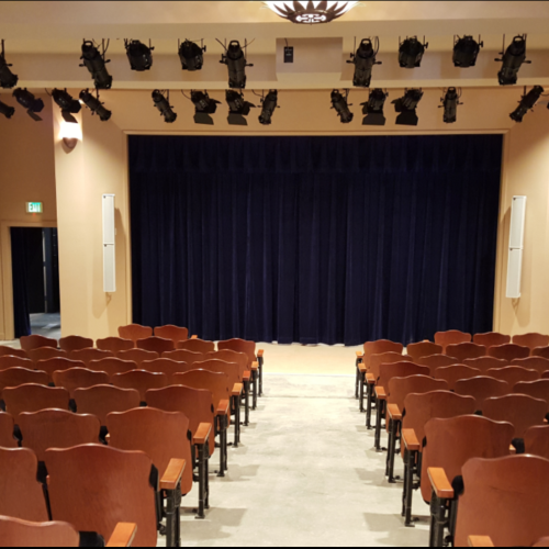 Photo of stage and seating inside the theater