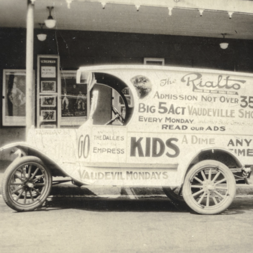 Promotion for upcoming shows on the side of a truck.