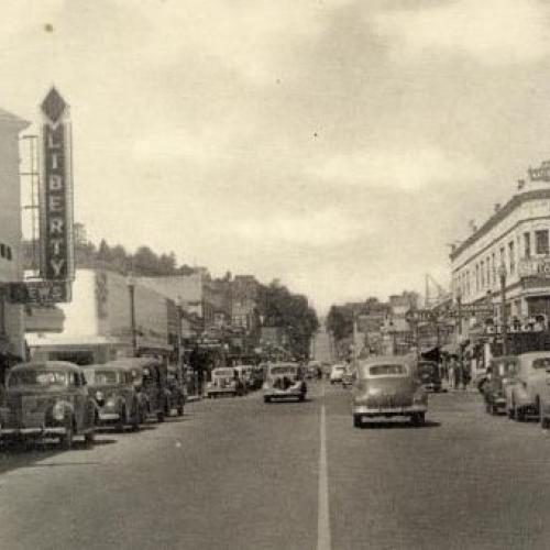 Commercial Street, Bank on right, c. 1940s. Astoria Oregon.