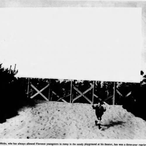 The sand hill playground in front of the screen
