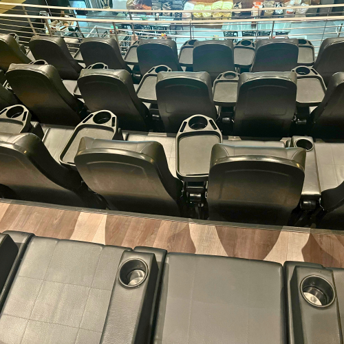 The theatre seating with tray tables on the balcony level at the Times