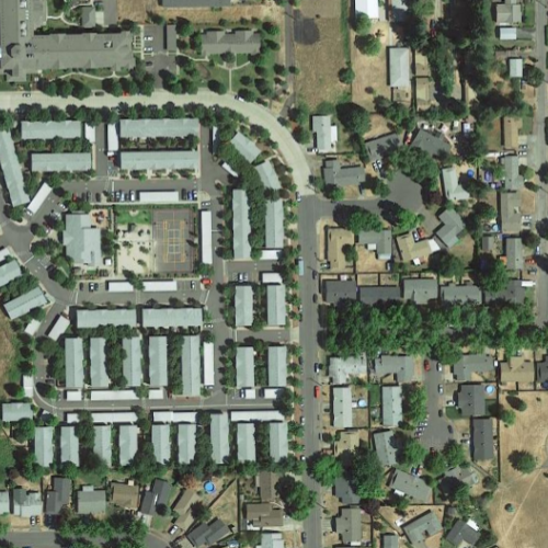 Full-color satellite image of the Jenna Village apartments from 2018.