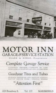 newspaper clipping of motor inn garage